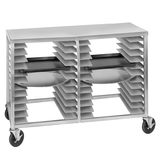 A white metal cart with shelves on wheels.