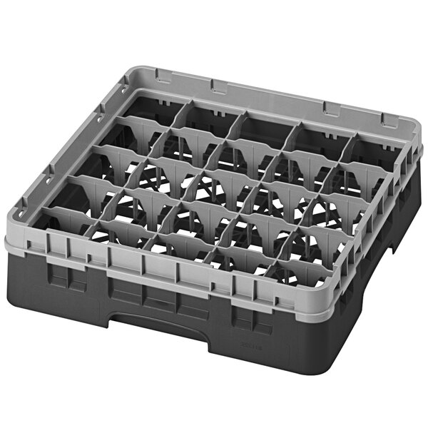 A black and grey plastic Cambro glass rack with many compartments.