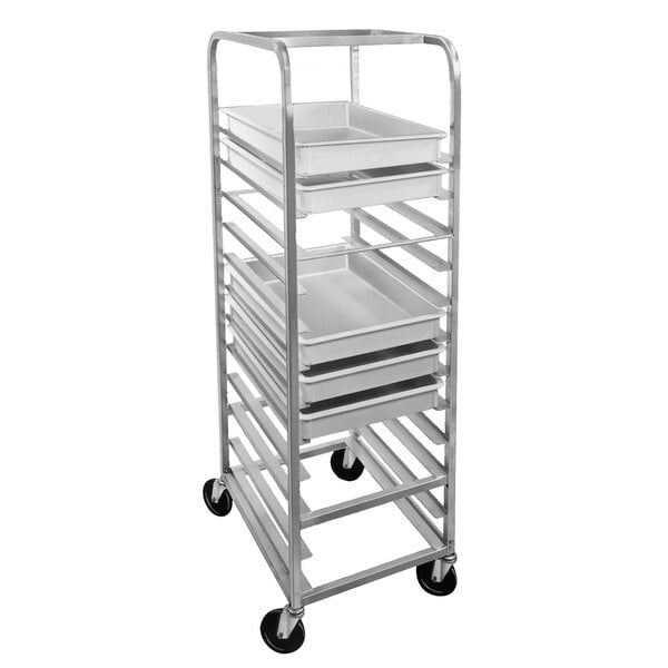 A white metal Channel pizza dough box rack with metal trays on it.
