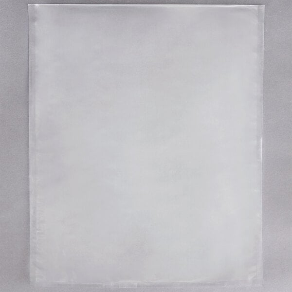 A white rectangular ARY VacMaster vacuum packaging bag on a gray surface.