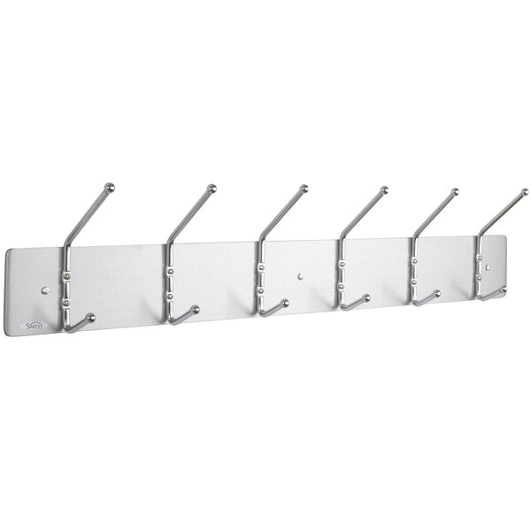 A Safco metal coat rack with six silver hooks.