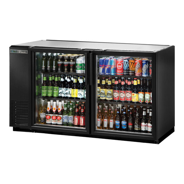 A black refrigerator with glass doors filled with bottles of beer.