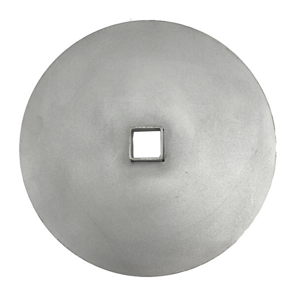 A metal circular disc with a square hole in the center.