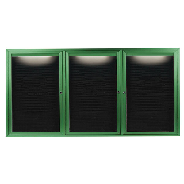 A green cabinet with black doors enclosing a black letter board with green trim.