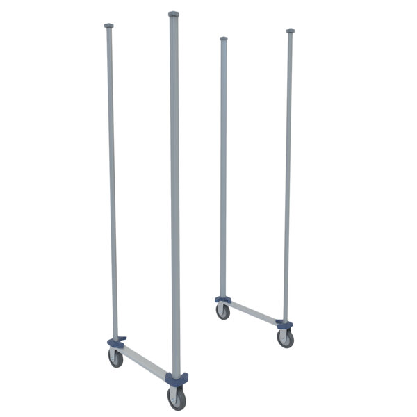 A pair of stainless steel MetroMax poles with wheels on them.