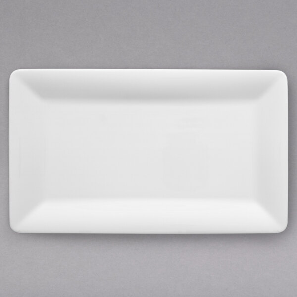 A white rectangular Villeroy & Boch porcelain platter with a curved edge.