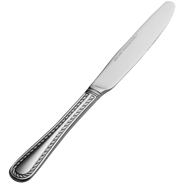 A close-up of a silver Bon Chef dinner knife with a solid handle.