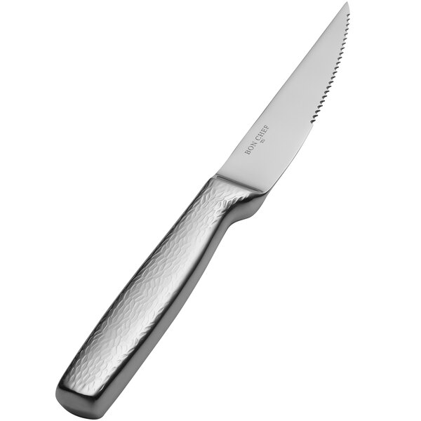 A Bon Chef Gaucho steak knife with a silver textured handle.