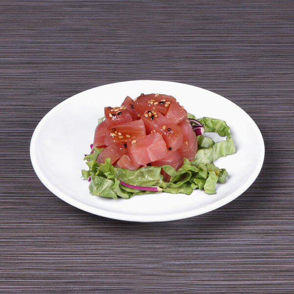 A plate of tuna salad on a white Elite Global Solutions melamine plate.