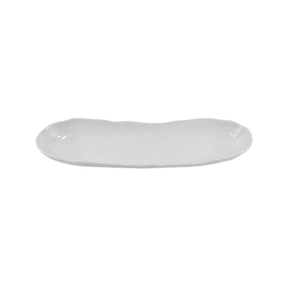 A white oval shaped melamine tray with uneven edges.