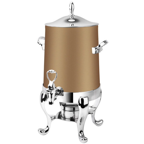 An Eastern Tabletop stainless steel coffee urn with bronze accents.