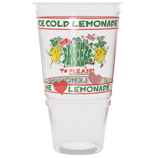 A clear plastic "We Squeeze to Please" lemonade cup with a lid and logo on the counter filled with cold lemonade.