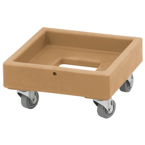 A brown plastic dolly with wheels designed for a Cambro milk crate.