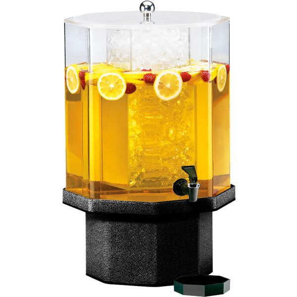 A Cal-Mil Classic beverage dispenser with yellow liquid and lemons in the ice chamber.