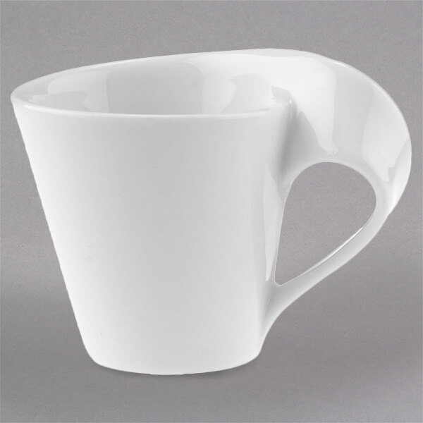 A white Villeroy & Boch porcelain espresso cup with a curved handle.