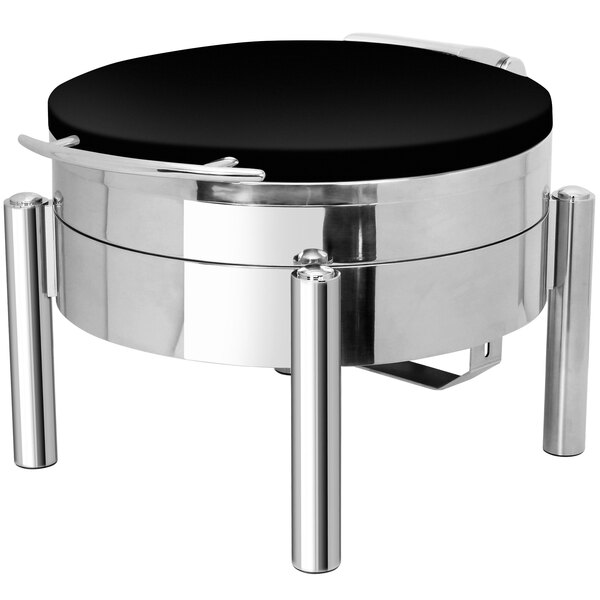 A black coated stainless steel round chafer with a lid on a metal and black table stand.