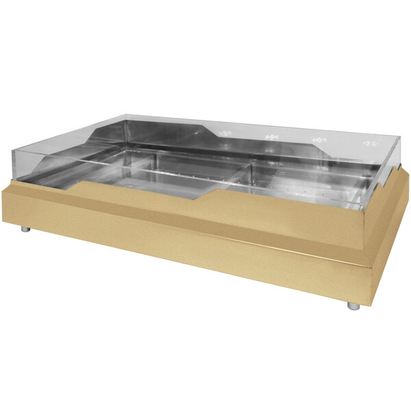 A bronze coated stainless steel raw bar with a wave design on a counter.
