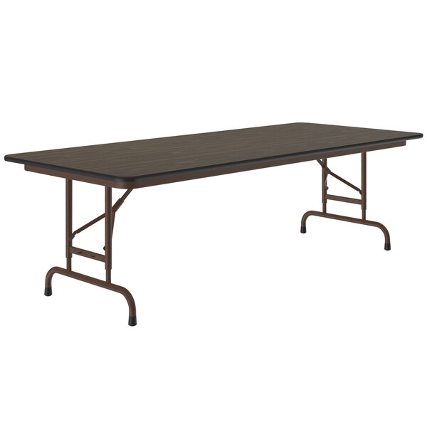 A Correll rectangular folding table with a walnut melamine top and metal frame.