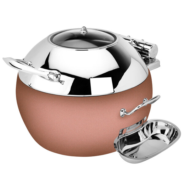 A stainless steel Eastern Tabletop soup chafer with a hinged glass dome lid and copper base.
