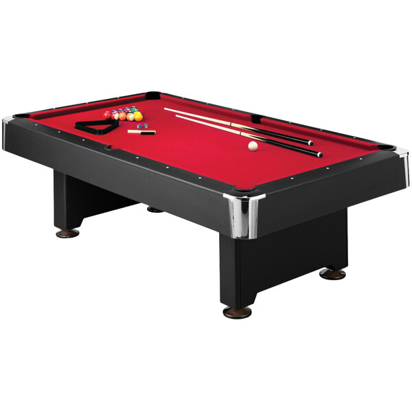 A red Mizerak Donovan II pool table with black accents, balls, and sticks on it.
