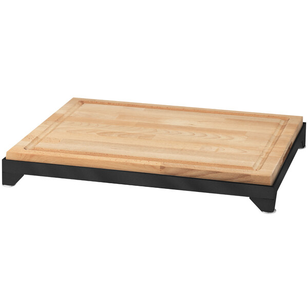 An Eastern Tabletop butcher block carving board with a black coated stainless steel frame.