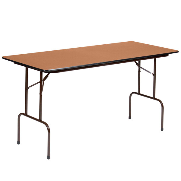 A medium oak rectangular folding table with metal legs.