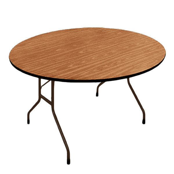 A Correll round folding table with a wooden top and metal legs.
