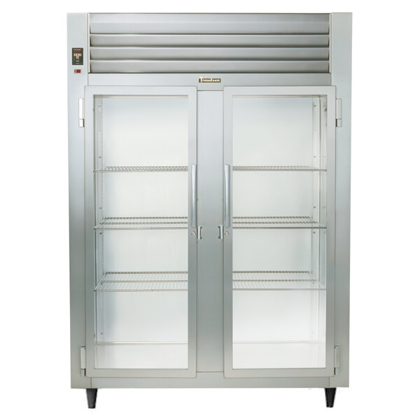 A Traulsen Specification Line stainless steel reach-in refrigerator with two glass doors.