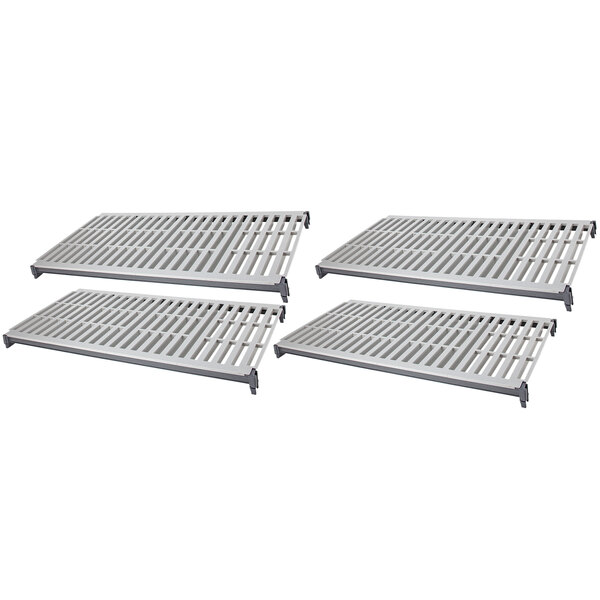 A white metal grate with holes for four grey metal shelves.