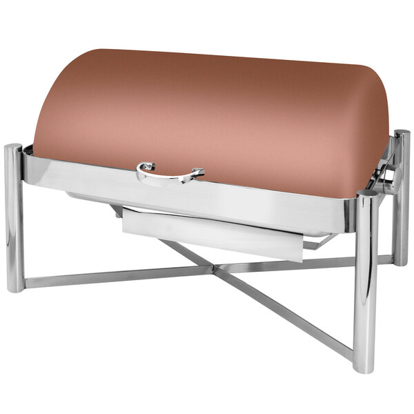 An Eastern Tabletop rectangular copper coated stainless steel chafing dish on a table with a brown leather cover.