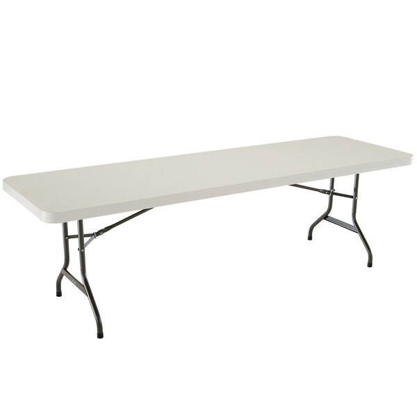 A white rectangular Lifetime folding table with black legs.