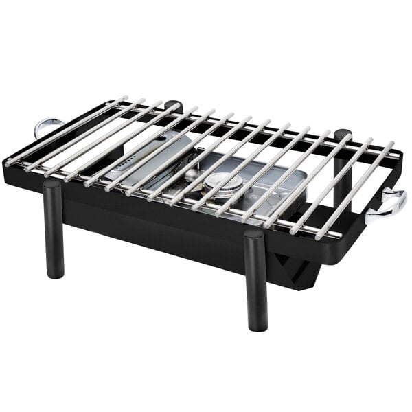 An Eastern Tabletop black coated stainless steel grill stand with removable grill top on a table.
