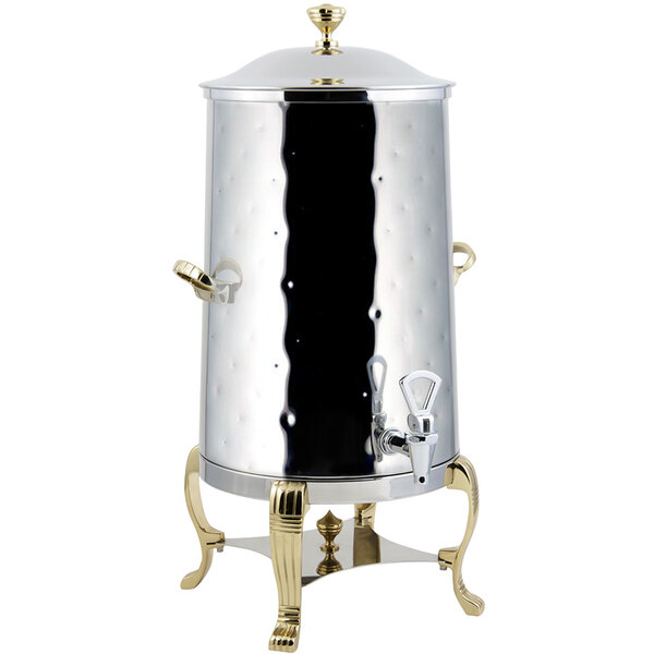 A silver metal Bon Chef coffee chafer urn with brass trim.