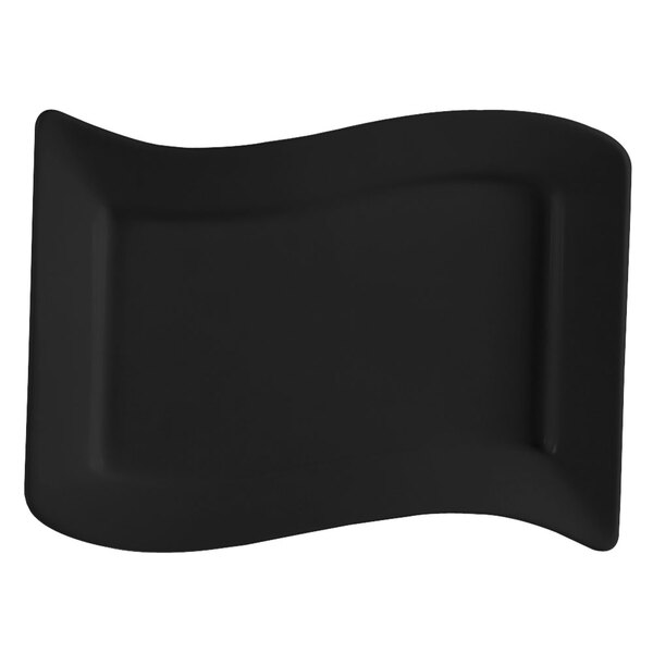 A black rectangular stoneware platter with a curved edge.