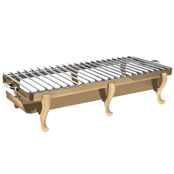 An Eastern Tabletop bronze coated stainless steel grill stand with a removable grill top on a metal table.