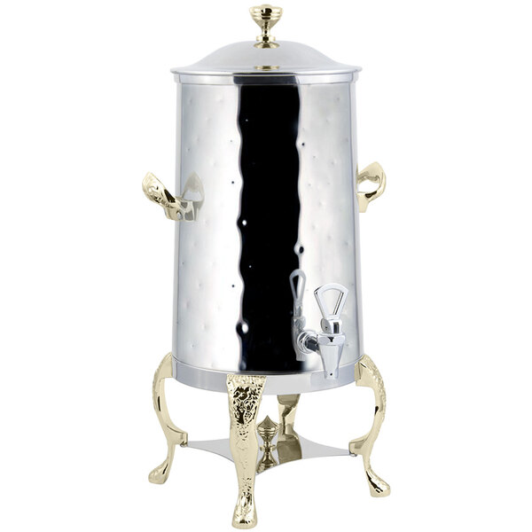 A silver and gold Bon Chef coffee chafer urn.