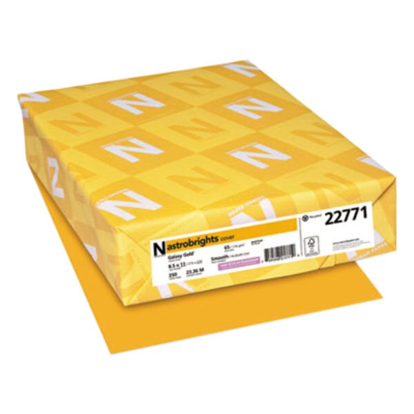 A yellow box of Astrobrights Galaxy Gold cardstock paper with white and yellow labels.