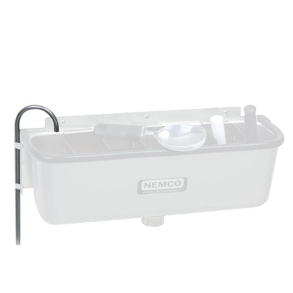 A white Nemco dipper well sink with a spoon in it.
