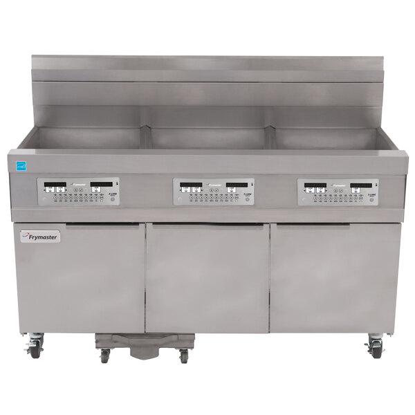 A Frymaster natural gas floor fryer system with three drawers and two doors.