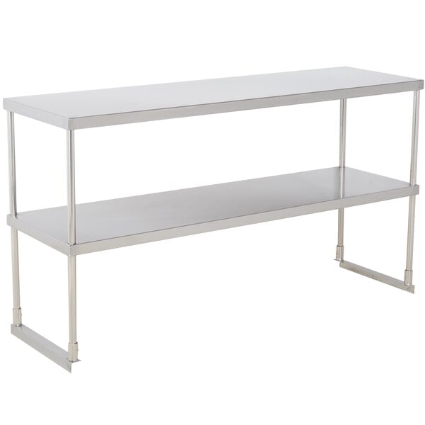 A Regency stainless steel double deck overshelf on a stainless steel table.
