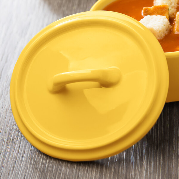 The yellow Bon Chef porcelain lid on a yellow oval container.