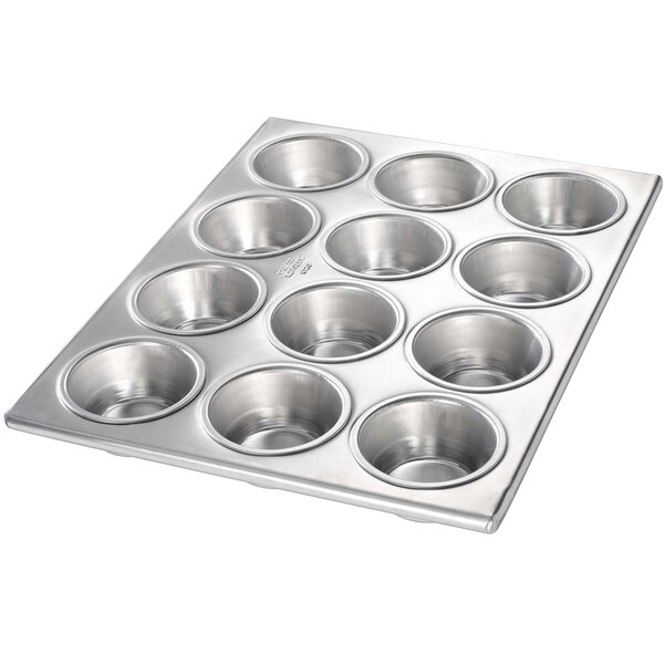 A silver Chicago Metallic muffin pan with 12 cups.