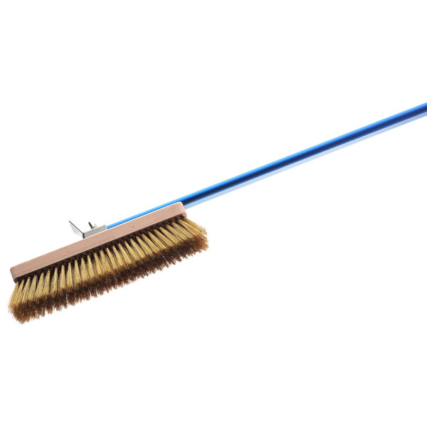 A GI Metal pizza oven brush with a blue handle.