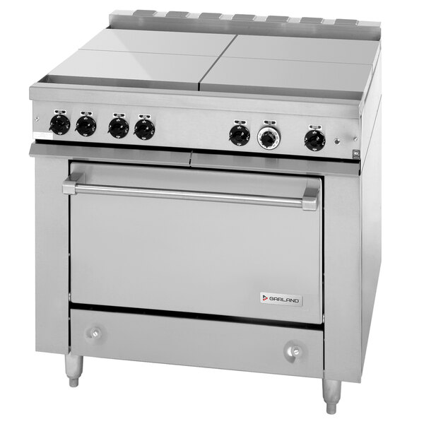A large stainless steel Garland electric range with a standard oven and four boiler top sections.