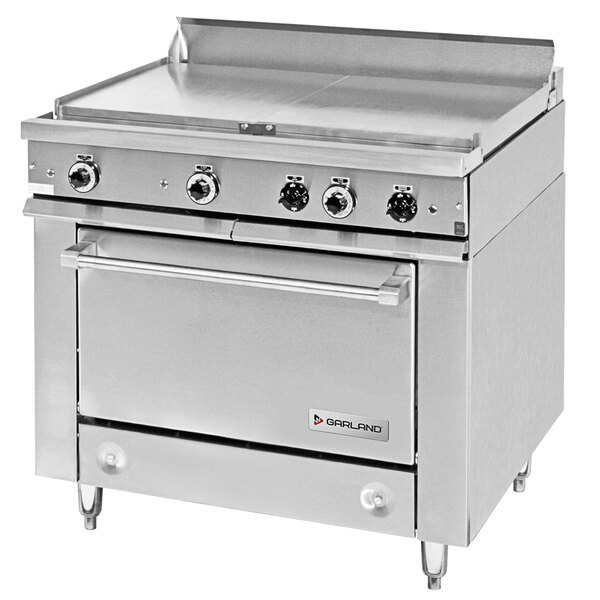 A stainless steel Garland commercial electric range with two all purpose top sections and a storage base with knobs.