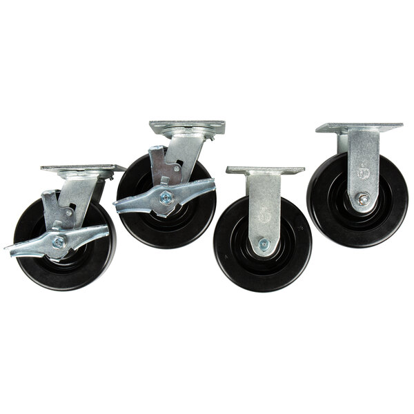 A set of four Vulcan casters with black rubber wheels.