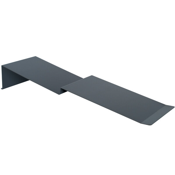 A grey metal Hatco MPWS-RISER Angled Riser on a black metal shelf.