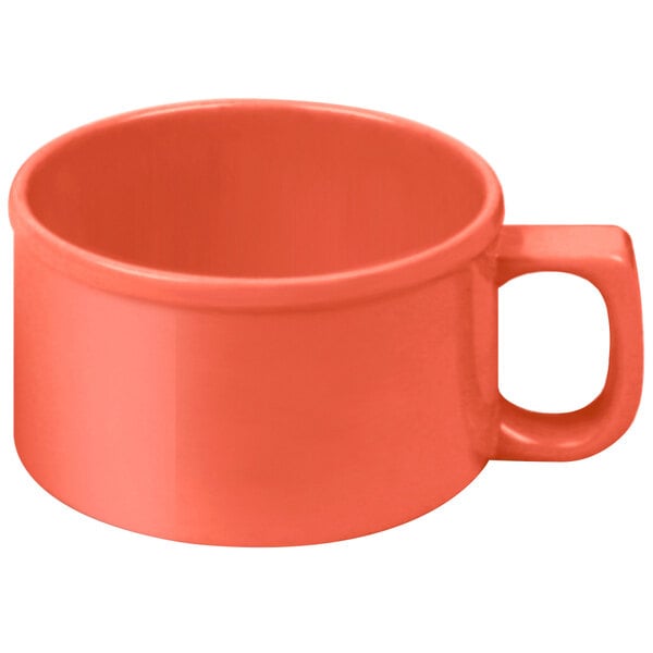 A close-up of a red Thunder Group soup mug with a handle.