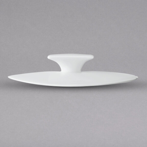 The white lid for a Villeroy & Boch Modern Grace sugar bowl with a hole in the middle.