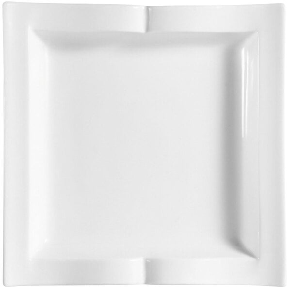 A white square plate with a corner cut out.